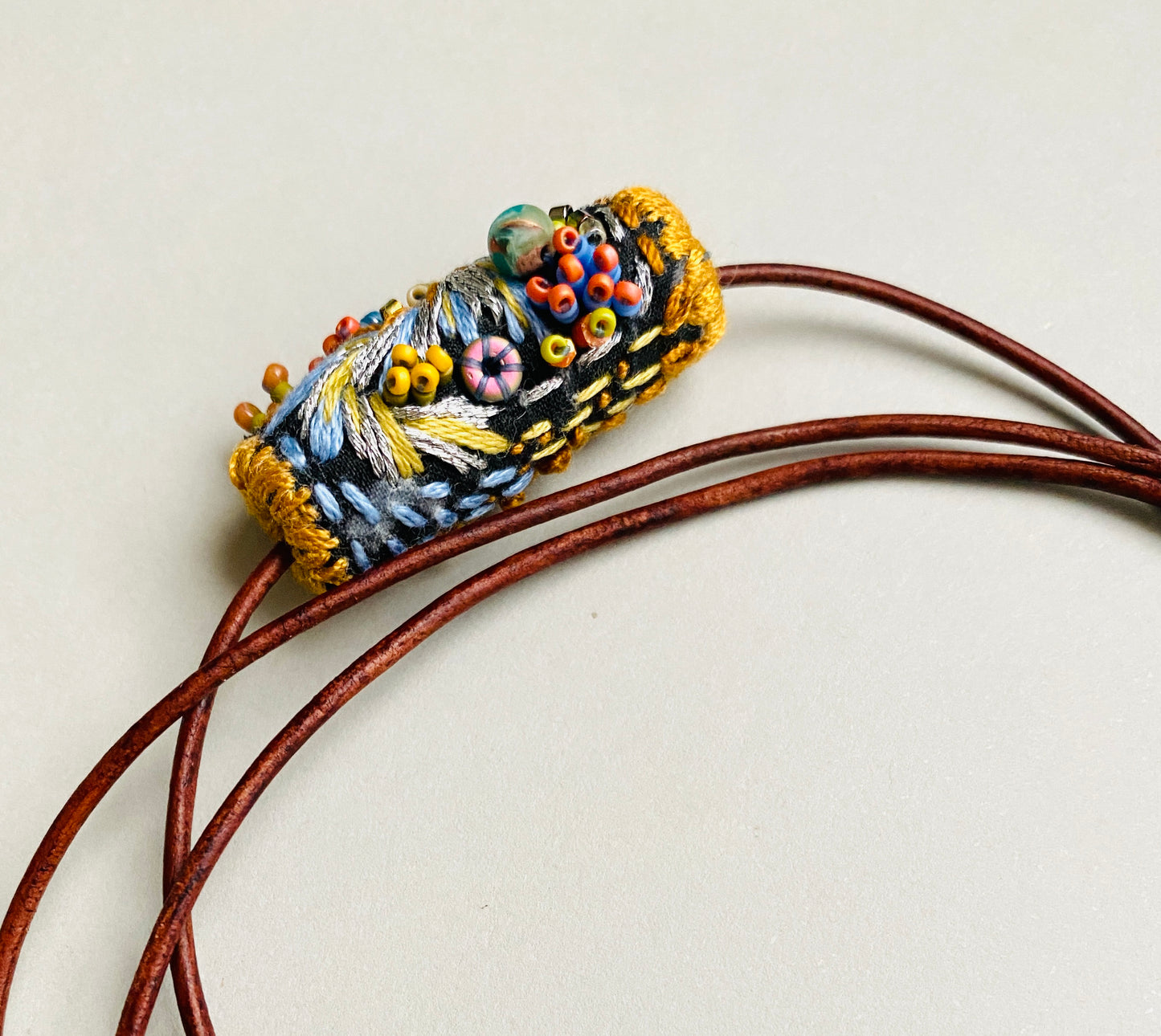 "Starlight" Navy, pale blue and silver embroidered and beaded textile necklace.