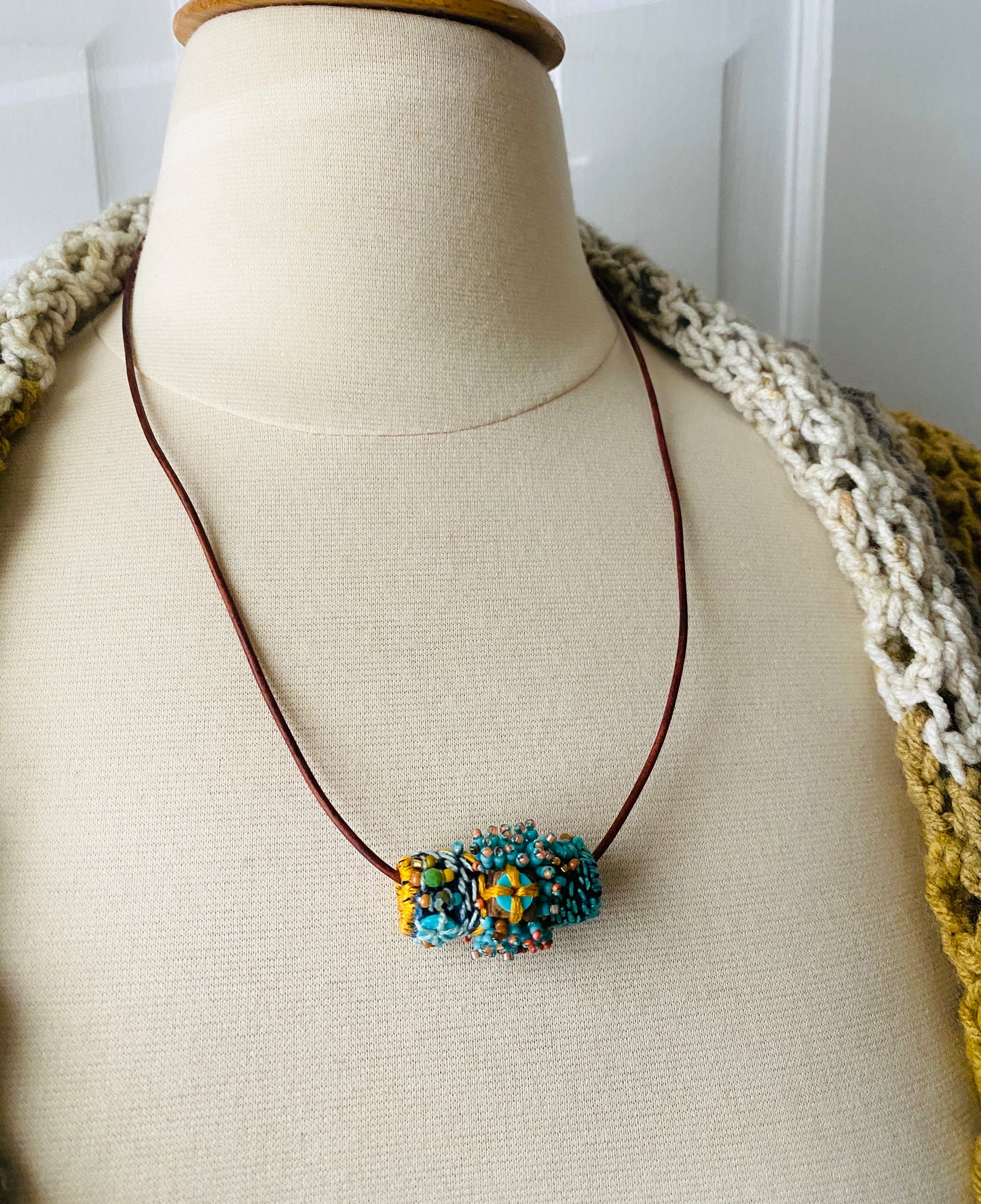 "Andromeda" turquoise embroidered and beaded textile necklace.