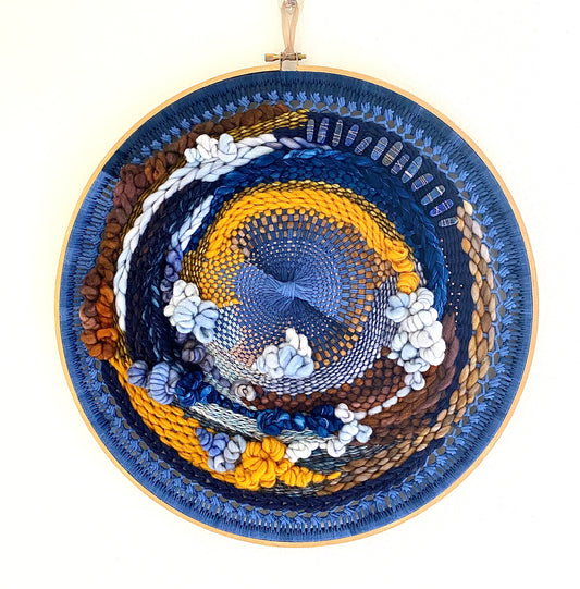 “Water stones" round woven wall hanging