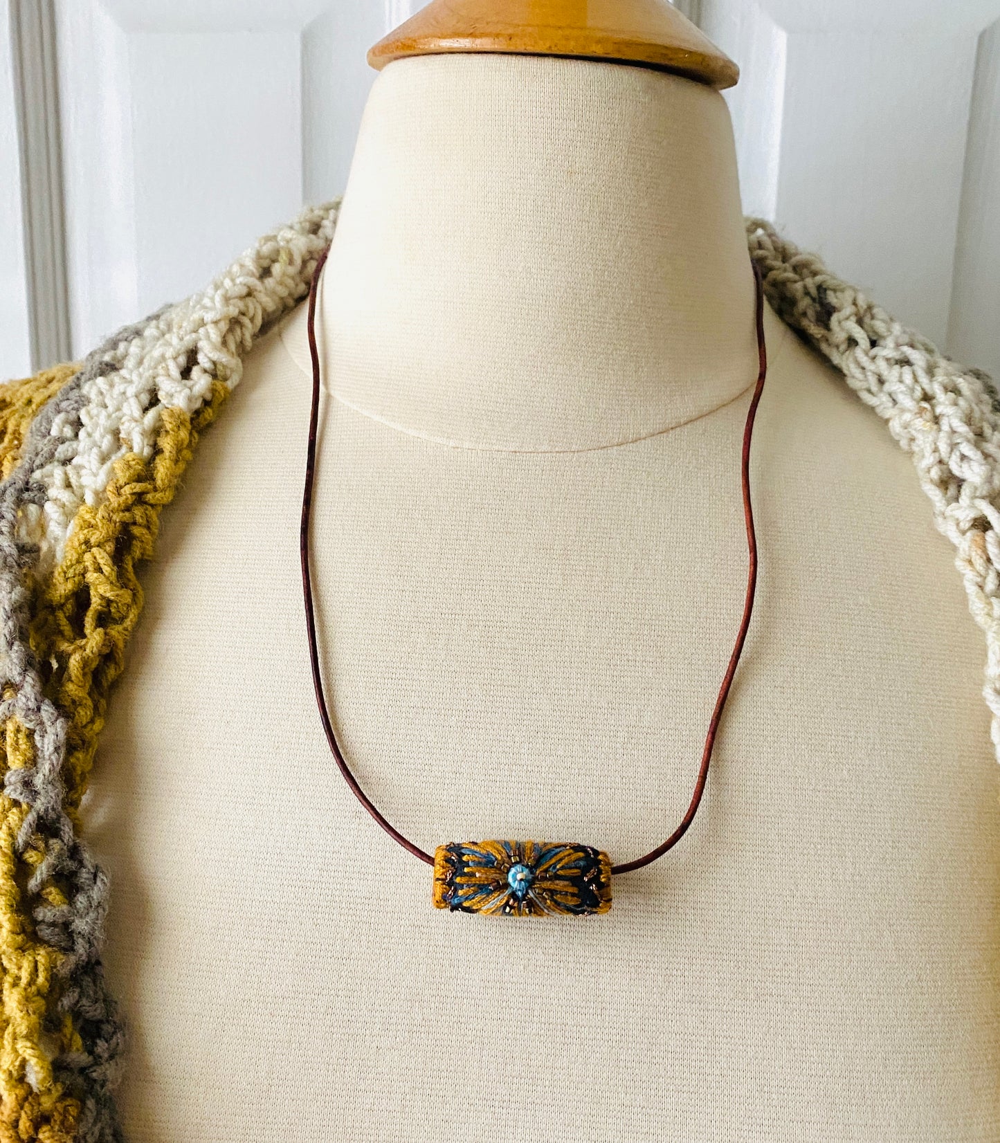 "Night star" textile necklace in copper and blue