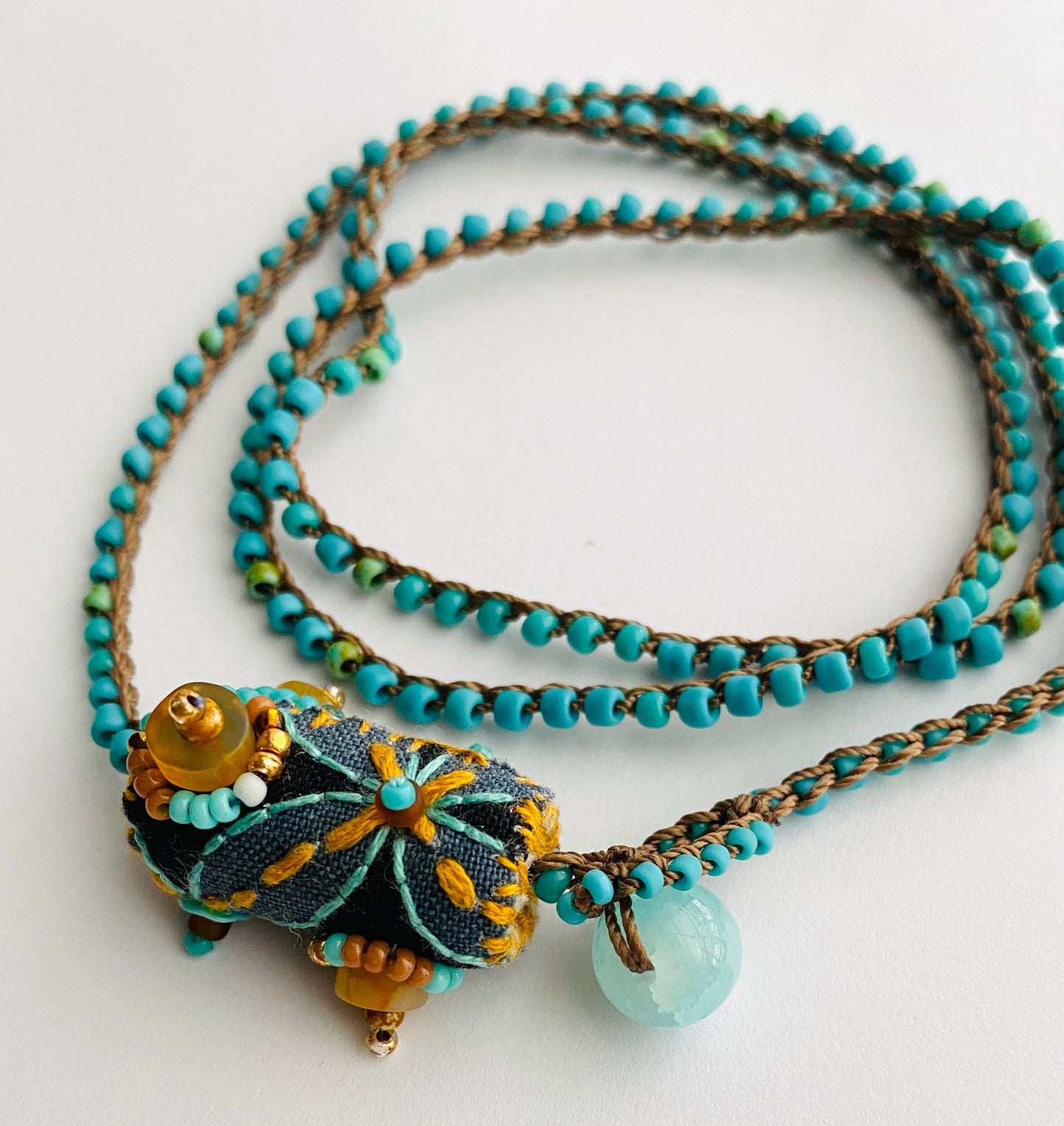 "Journey" Aqua and gold embroidered bead textile necklace