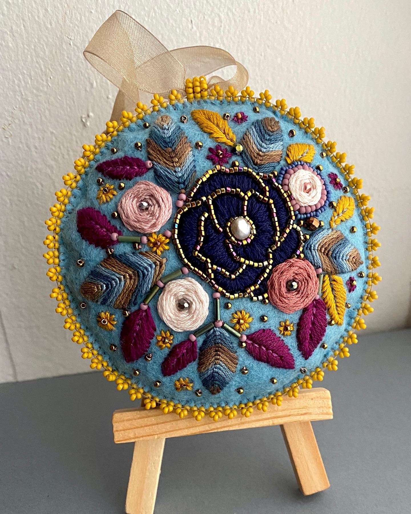 Blue and gold little pillow wall ornament